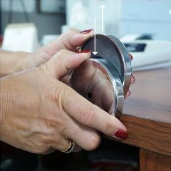 Slide the bottom of the magnetic hook