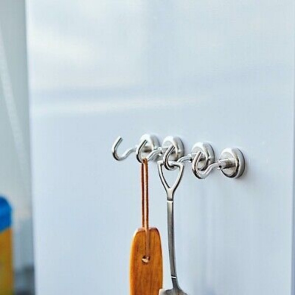 Attach the magnetic hook to flat surface